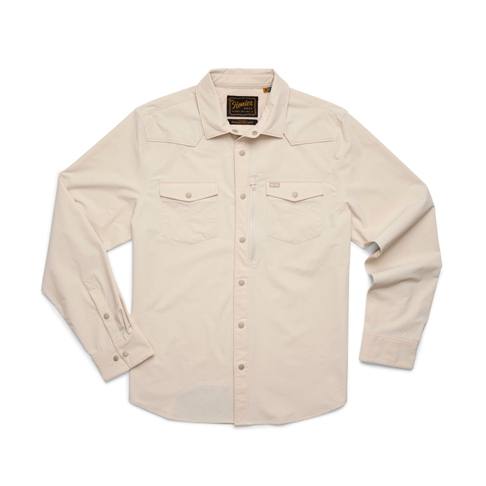 Howler Bros Emerger Tech long sleeve shirt in chalk beige with snap pockets and UPF 35 protection