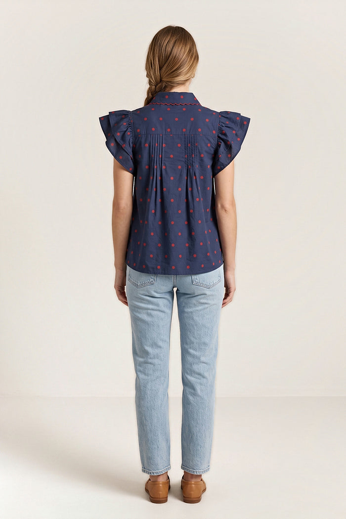 Back view of the navy sailmaker blouse with a shoulder yoke and pintucks.