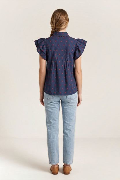 Back view of the navy sailmaker blouse with a shoulder yoke and pintucks.